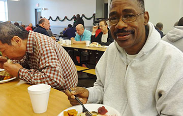 Man eating Christmas dinner