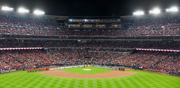 The Washington Nationals and Houston Astros line up for the national anthem before Game 3 of the World Series. (Jonathan Newton/The Washington Post)